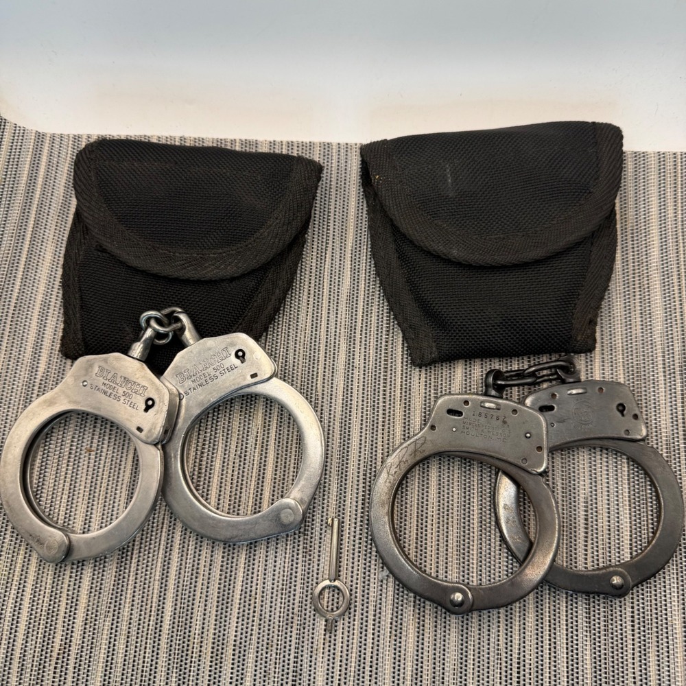 Bianchi 500 Stainless & Smith Wesson M-100 Handcuffs with Aker Pouches and Key